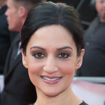 She is getting pictures clicked for the cameras.